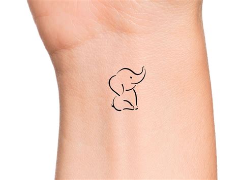 tribal elephant tattoo|small elephant tattoos designs.